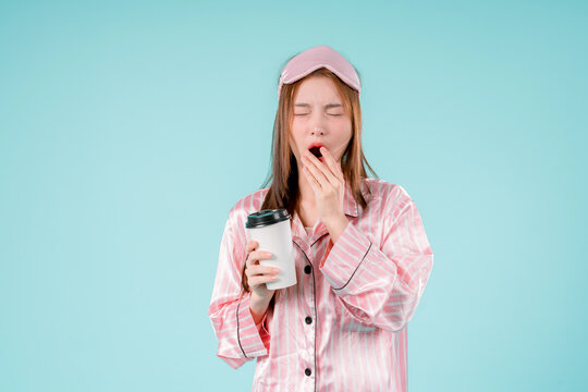 Woman Lady Positive Coffee Asin Drink Cup Stain Expression Lovely, A Pretty Teen Model Holding a Mug, Posing in Colorful Pajamas with a Bright Smile in Studio