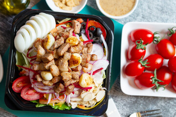 Salad with meat in a bowl