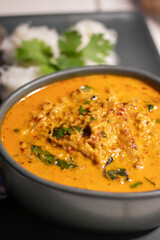 Crab and betel leaf curry. Thai Southern-style crab yellow curry with betel leaves and garlic rice noodles.