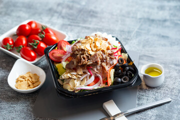 Salad with meat in a bowl