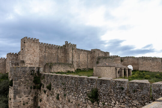 Medieval castle of trujillo showing its walls and cloudy sky