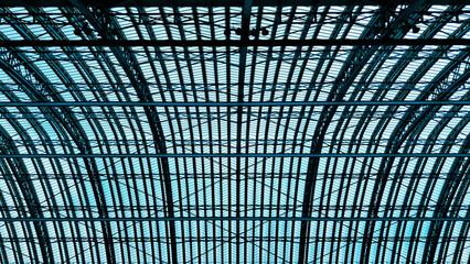 Urban architectural roofing in a public transportation or exhibition space..