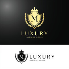Luxury Crest Logo with Letter in Golden Shield and Laurel Design