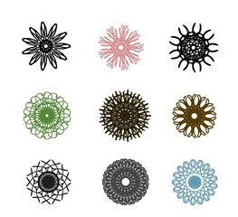 A set of decorative mandala and flower symbols in various colors and styles on white background....
