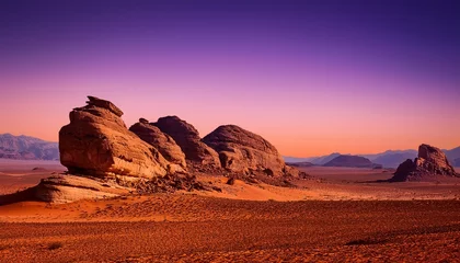 Fototapete serene desert landscape with rocks against violet gradient sky © Mara
