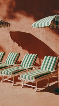 retro striped poolside lounge chairs turquoise green vintage resort aesthetic shadow composition
