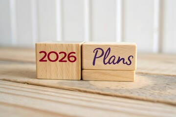 2026 plans in wooden blocks. Setting goal, target for next year. Plan and tasks. Financial management in company. Business and finance concept