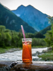A vibrant grid of Italian soda beverages with straws and scenic outdoor views