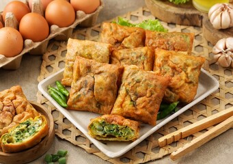 Martabak Telur. Mini egg martabak is a snack made from eggs. Its delicious taste and mini shape make it suitable for serving as a family snack.