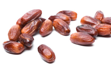 Dry tasty dates on white background