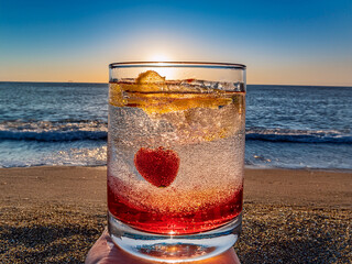 Italian soda drinks with vibrant colors and fruit toppings photographed at the ocean