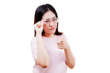 Asian young beautiful woman wearing glasses points forward with a confident and assertive expression, dressed in a light pink shirt.