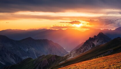 dramatic sunset over mountainous landscape