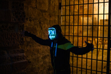 Purge mask, halloween with pumpkin. LED mask, creepy scary man. Corona, Funny, October, outside