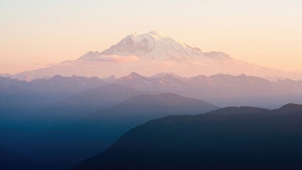 Majestic Snow Capped Mountain Range at Dawn peak