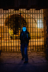 Purge mask, halloween with pumpkin. LED mask, creepy scary man. Corona, Funny, October, outside
