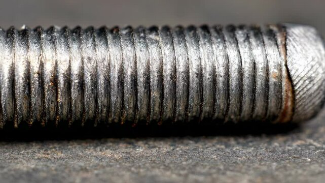 Close-up of a rusty threaded rod