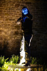 Purge mask, halloween with pumpkin. LED mask, creepy scary man. Corona, Funny, October, outside