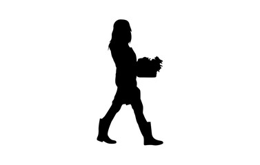 A woman carrying small flowering plants in a box vector