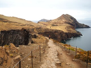Desert landscapes of Cape Sao Lourenco. A narrow path over a cliff. Nature of Madeira Island,...