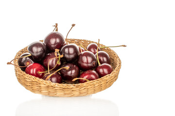 Sweet ripe cherry, macro, isolated on white background.