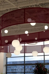 Ceiling with chandeliers in a shopping center.