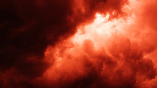 Surreal red toned storm clouds swirling in the sky, creating a dramatic, abstract, and atmospheric scene