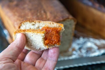 Rustic colonial rye bread, with chimia or pumpkin jam. Well-lit image, clear selective focus on the details of the texture of the bread and the jam, conveying tradition, rusticity and homemade flavor