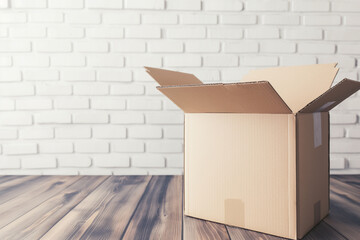 empty open box on white brick wall background with space for inscription
