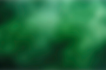 Emerald blurred background showcases a smooth transition with vibrant green hues