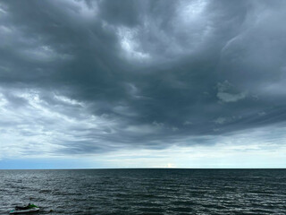 Moody Sky and Calm Sea Before the Storm
