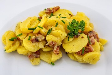 Potato salad with bacon, vinegar, and oil