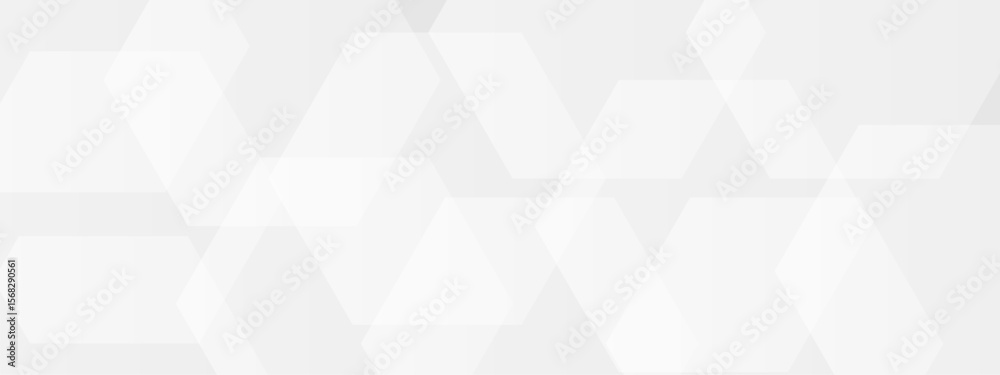 Wall mural abstract seamless background with overlapping translucent white hexagons on a light gray to white gr
