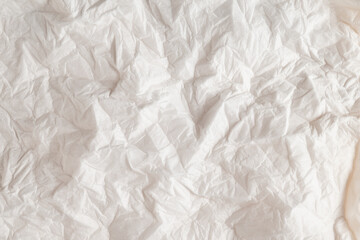 Wrinkled white paper texture background
