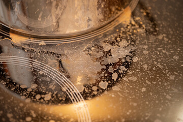 Dirty glass stove with food stains
