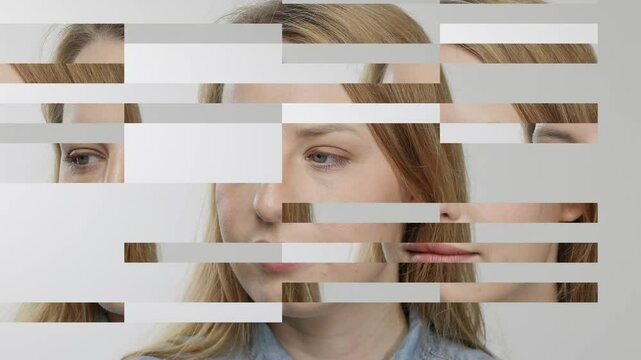 Female head shot breaking into pixelated squares 