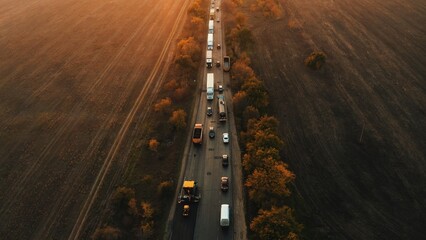 Aerial view of road being resurfaced at sunset