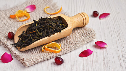 Loose Leaf Black Tea in Scoop with Rose Petals and Orange Zest