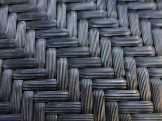 Black woven chair texture details. minimalist home interior.