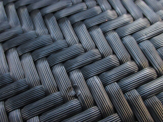 Black woven chair texture details. minimalist home interior.