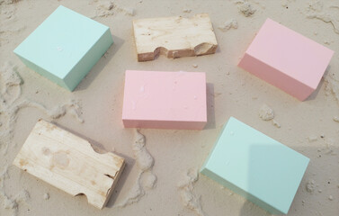 Painted Blocks and Wood Pieces on Sand