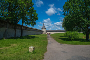 View of the fortress wall of Pskov Krom and Kutekroma Tower, Russia