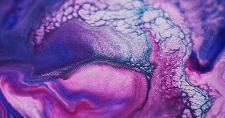 Defocused paint. Wet ink. Blur purple blue red color water liquid enamel acrylic ripple texture...
