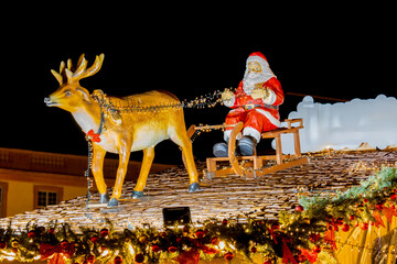Father Christmas with his reindeer at the Christmas market in Darmstadt.