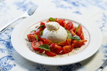 Italian salad with burrata cheese