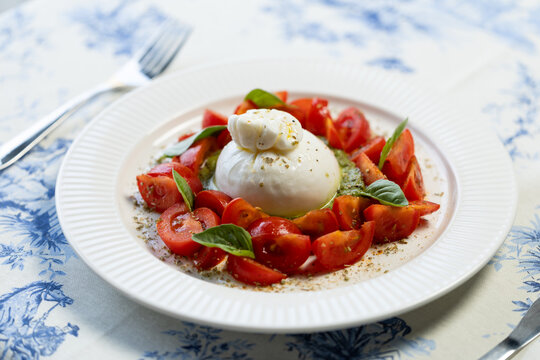 Italian salad with burrata cheese