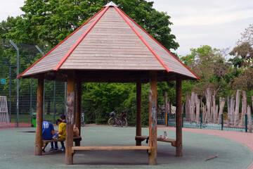 wooden pavilion on a sports and play area