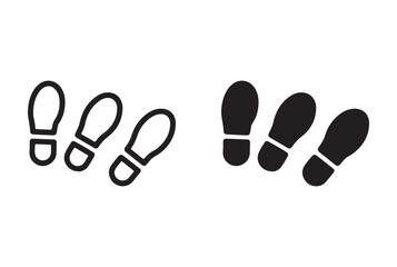 Two sets of footprint icons one outlined and one solid black isolated on white background