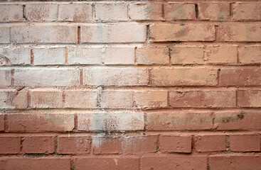 Background of old brick wall stained with white paint