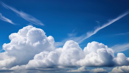 fast moving white clouds on blue sky